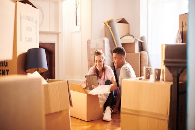 young couple in their new house
